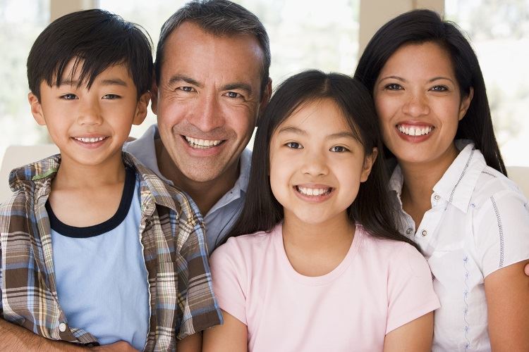 couple with adopted children