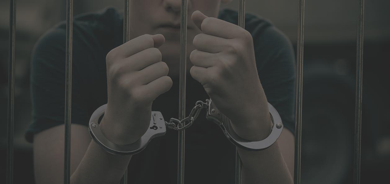 teen in handcuffs